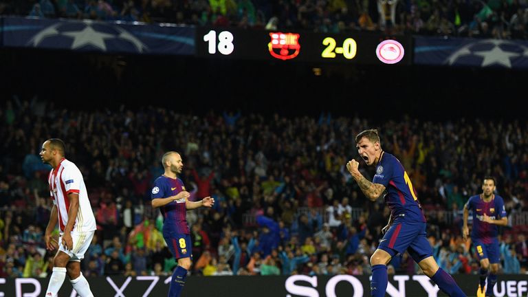 Lucas Digne celebrates scoring against Olympiakos in October 2017