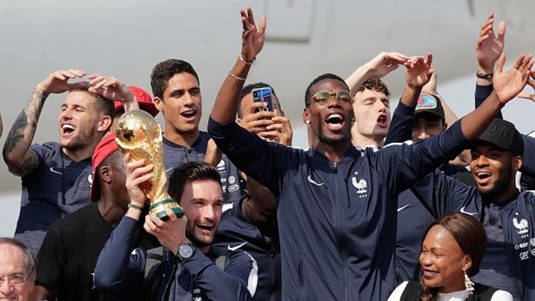 The victorious France squad touch down in Paris