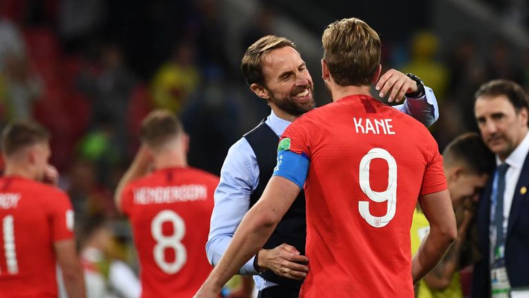 Gareth Southgate embraces captain Harry Kane after the game