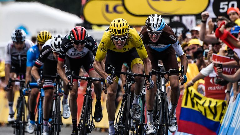 Geraint Thomas sprints to a second-place finish on stage 19