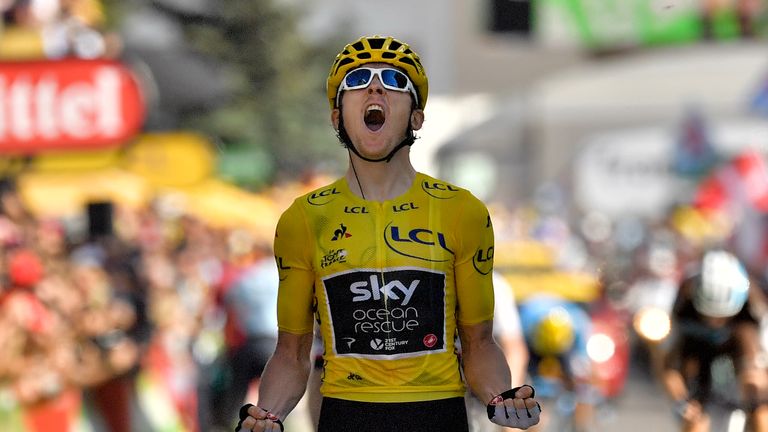 Geraint Thomas celebrates his win on the Alpe d'Huez