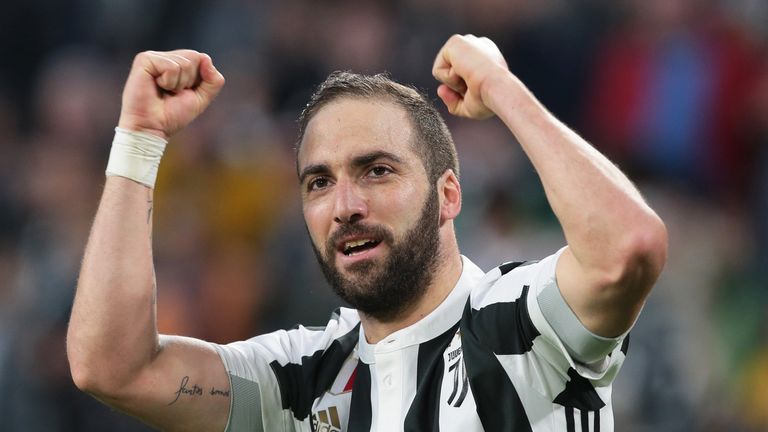 Gonzalo Higuain celebrates after scoring the opening goal during the Serie A match between Juventus and Atalanta at Allianz Stadium on March 14, 2018