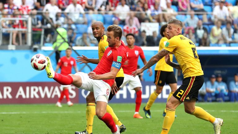 Harry Kane stretches for an effort against Belgium