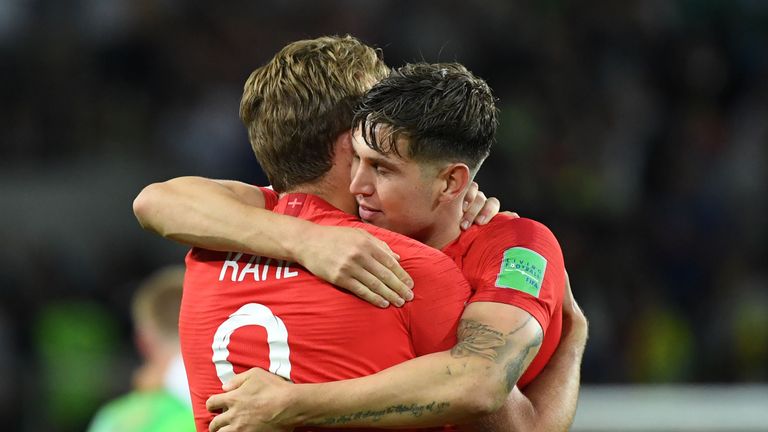 Harry Kane and John Stones celebrate winning the penalty shootout