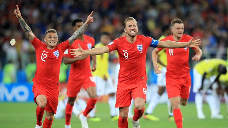 England's players celebrate winning the penalty shootout against Colombia