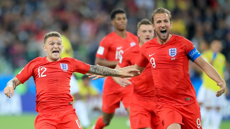 England's players celebrate winning the penalty shootout against Colombia