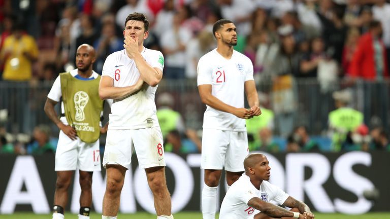 England players are dejected following the 2-1 loss to Croatia