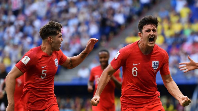 John Stones and Harry Maguire celebrate the latter's goal for England against Sweden in the World Cup quarter-final