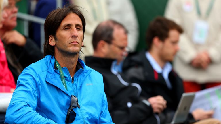 Heather Watson of Great Britain's coach Diego Veronelli watches her women's singles match against Barbora Zahlavova Strycova of Czech Republic on day three of the French Open at Roland Garros on May 27, 2014 in Paris, France.