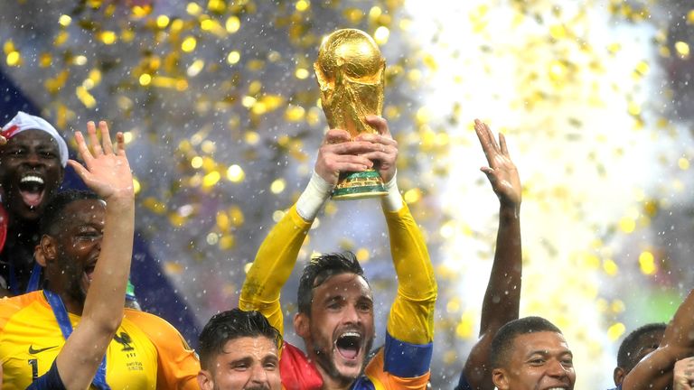 France captain Hugo Lloris lifts the World Cup trophy after the 4-2 defeat of Croatia
