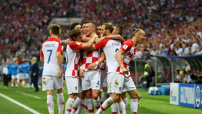 Goalscorer Ivan Perisic celebrates with teammates after equalising for Croatia