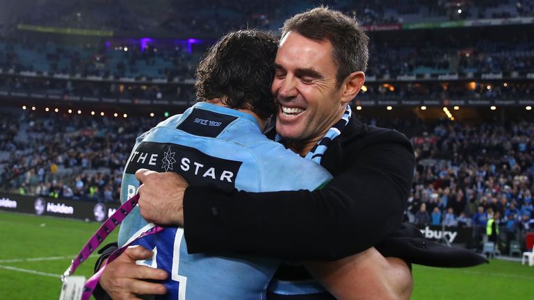 James Roberts of the Blues and Blues coach Brad Fittler celebrate victory after game two of the State of Origin series 2018