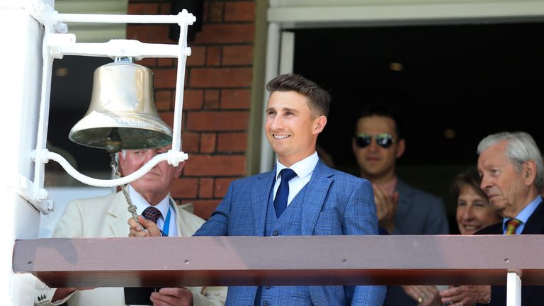 Former England cricketer James Taylor rings the five minute bell on day one of the First Investec Test match at Lord's