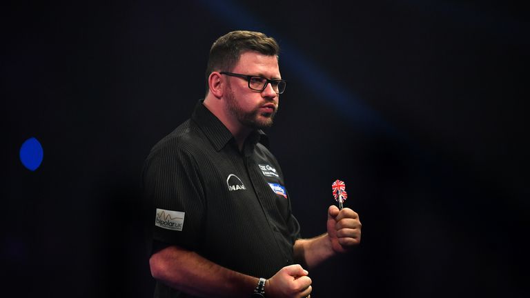James Wade of England celebrates during his first round match against Ronny Huybrechts of Belgium on day seven of the 2017 William Hill PDC World Darts Championships at Alexandra Palace on December 21, 2016 in London, England.