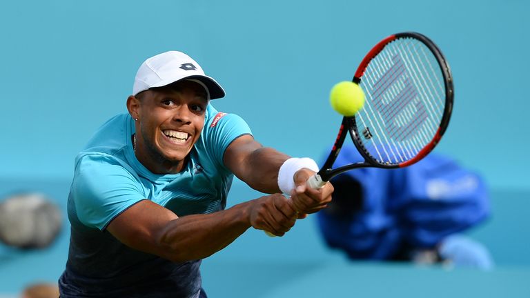 Jay Clarke of Great Britain hits a backhand during the first round match against Sam Querrey of the United States during Day one of the Fever-Tree Championships at Queens Club on June 18, 2018 in London, United Kingdom.
