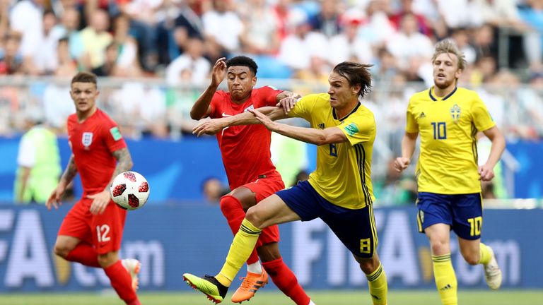 Jesse Lingard competes for the ball during the 2018 FIFA World Cup Russia Quarter Final match between Sweden and England at Samara Arena on July 7, 2018 in Samara, Russia.