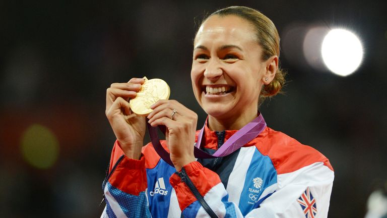 Gold medalist Britain's Jessica Ennis celebrates on the podium of the heptathlon at the athletics event during the London 2012 Olympic Games on August 4, 2012 in London.