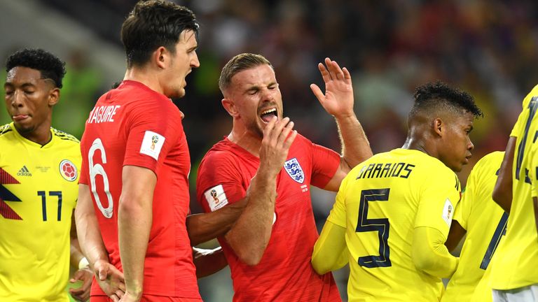 Jordan Henderson reacts following a headbutt ot the chest then chin from Wilmar Barrios