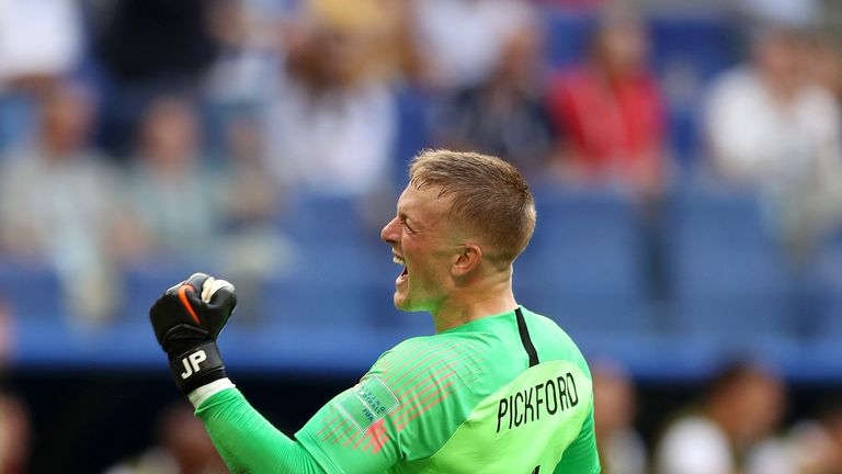 Jordan Pickford celebrates England's opening goal against Sweden