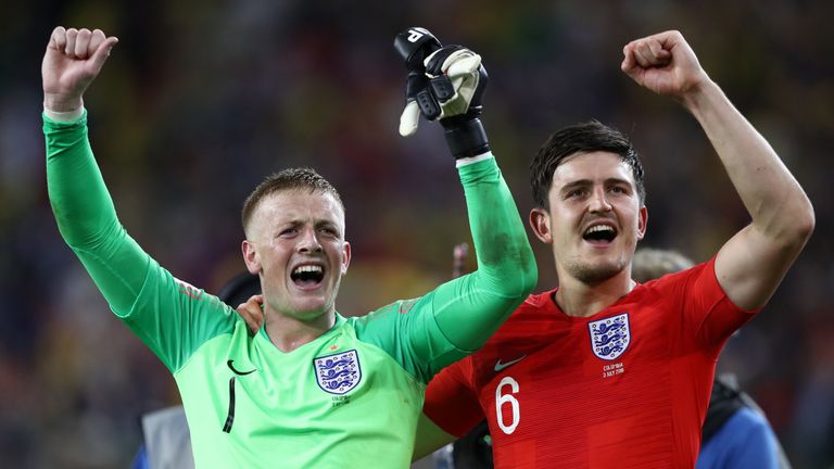 Jordan Pickford and Harry Maguire celebrate the 4-3 penalty shootout victory over Colombia