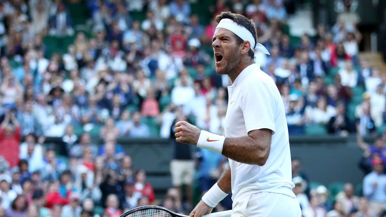 Juan Martin del Potro of Argentina celebrates winning a point against Rafael Nadal of Spain during their Men's Singles Quarter-Finals match on day nine of the Wimbledon Lawn Tennis Championships at All England Lawn Tennis and Croquet Club on July 11, 2018 in London, England. 