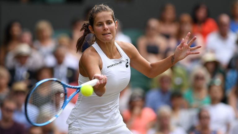 Germany's Julia Goerges returns against US player Serena Williams during their women's singles semi-final match on the tenth day of the 2018 Wimbledon Championships at The All England Lawn Tennis Club in Wimbledon, southwest London, on July 12, 2018. 