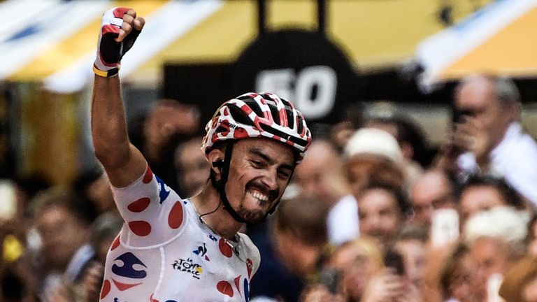 Julian Alaphilippe crosses the line to win stage 16