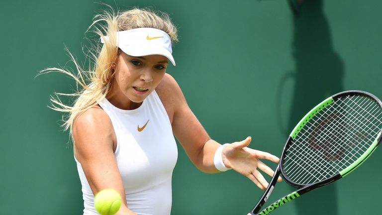 Britain's Katie Boulter returns against Japan's Naomi Osaka during their women's singles second round match on the fourth day of the 2018 Wimbledon Championships at The All England Lawn Tennis Club in Wimbledon, southwest London, on July 5, 2018