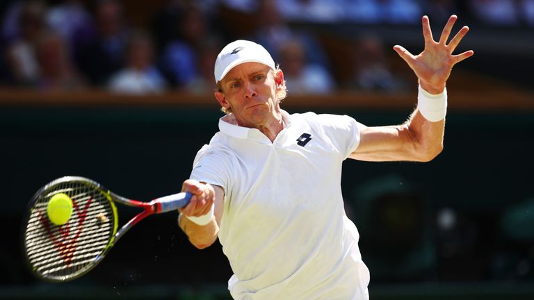 Kevin Anderson of South Africa returns against Novak Djokovic of Serbia during the Men's Singles final on day thirteen of the Wimbledon Lawn Tennis Championships at All England Lawn Tennis and Croquet Club on July 15, 2018 in London, England.