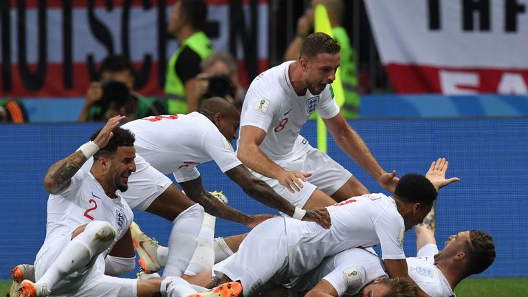 Kieran Trippier is mobbed by teammates after giving them a 1-0 lead