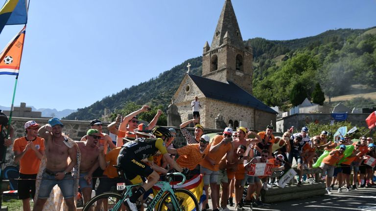 Steven Kruijswijk is cheered on by Dutch fans on his ascent up Alpe d'Huez
