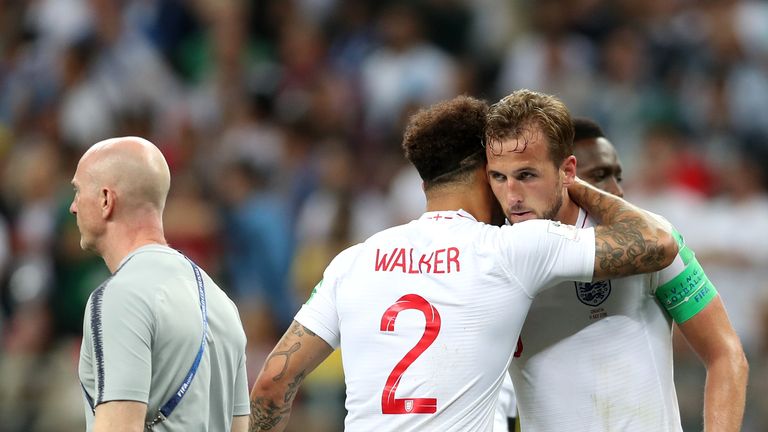 Kyle Walker and Harry Kane embrace after the 2-1 loss to Croatia