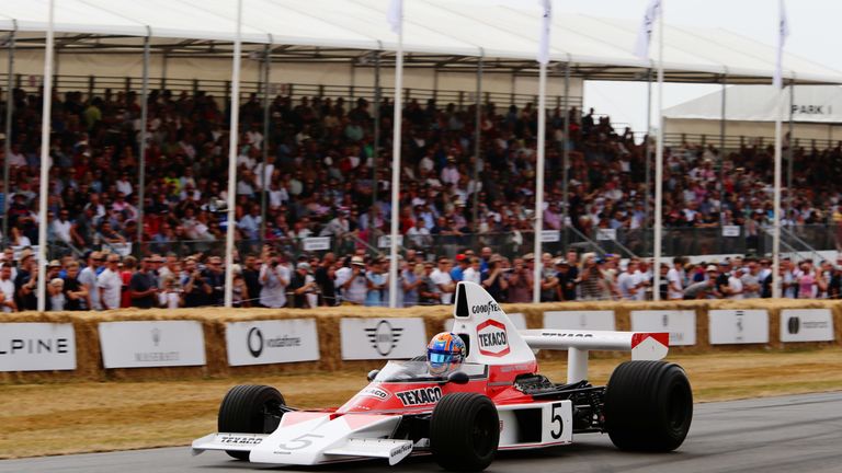 Lando Norris in the McLaren M23 at the Goodwood Festival of Speed