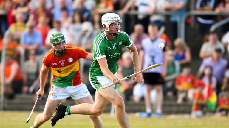 Kyle Hayes of Limerick in action against David English of Carlow