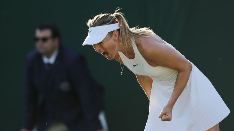 Russia's Maria Sharapova celebrates a point against Russia's Vitalia Diatchenko during their women's singles first round match on the second day of the 2018 Wimbledon Championships at The All England Lawn Tennis Club in Wimbledon, southwest London, on July 3, 2018. 