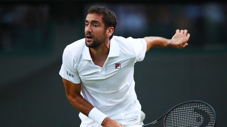 Marin Cilic of Croatia in action against Guido Pella of Argentina during their Men's Singles second round match on day three of the Wimbledon Lawn Tennis Championships at All England Lawn Tennis and Croquet Club on July 4, 2018 in London, England.