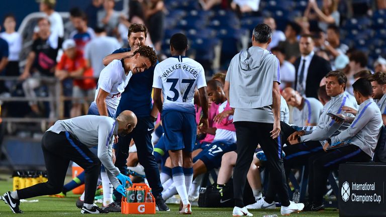 Mauricio Pochettino congratulates Luke Amos as he comes off after starting in midfield against AS Roma on July 25, 2018