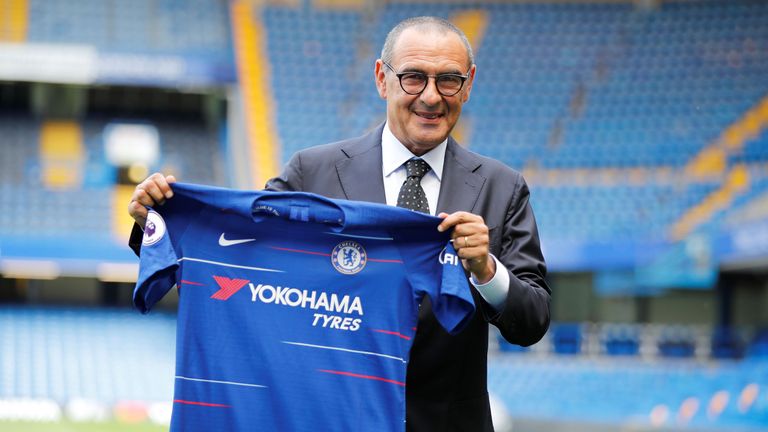Chelsea's newly appointed manager, Maurizio Sarri, poses for photographs on the pitch at Stamford Bridge during his unveiling