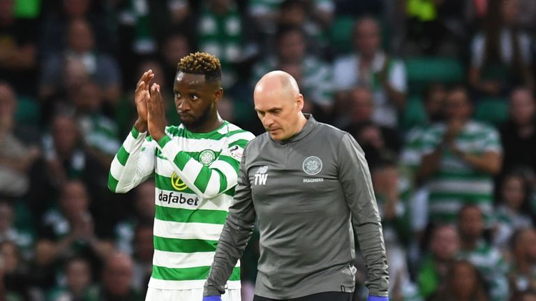Celtic's Moussa Dembele leaves the field with an injury against Alashkert