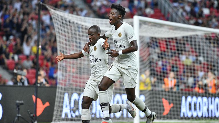 Moussa Diaby (left) celebrates with Timothy Weah after scoring a goal against Atletico Madrid in the International Champions Cup