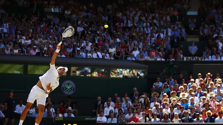 Novak Djokovic of Serbia serves against Kevin Anderson of South Africa during the Men's Singles final on day thirteen of the Wimbledon Lawn Tennis Championships at All England Lawn Tennis and Croquet Club on July 15, 2018 in London, England.