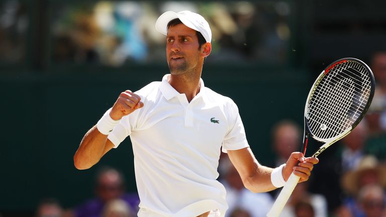 Novak Djokovic of Serbia celebrates a point against Kevin Anderson of South Africa during the Men's Singles final on day thirteen of the Wimbledon Lawn Tennis Championships at All England Lawn Tennis and Croquet Club on July 15, 2018 in London, England.