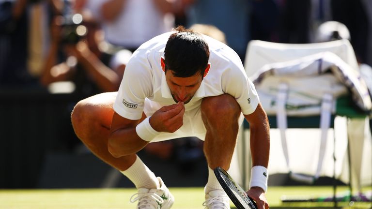 Novak Djokovic of Serbia celebrates his victory over Kevin Anderson of South Africa after the Men's Singles final on day thirteen of the Wimbledon Lawn Tennis Championships at All England Lawn Tennis and Croquet Club on July 15, 2018 in London, England