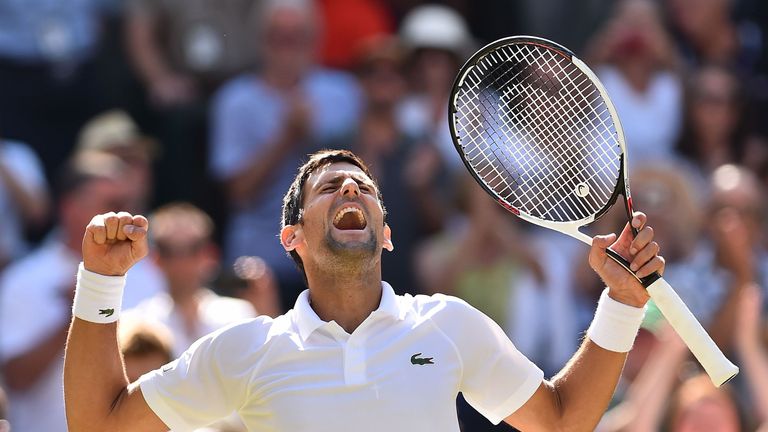 Serbia's Novak Djokovic celebrates after beating South Africa's Kevin Anderson 6-2, 6-2, 7-6 in their men's singles final match on the thirteenth day of the 2018 Wimbledon Championships at The All England Lawn Tennis Club in Wimbledon, southwest London, on July 15, 2018.