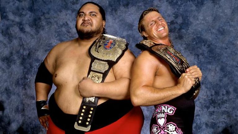 Owen Hart and Yokozuna teamed up to win the tag team titles at WrestleMania XI