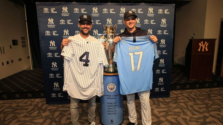 Manchester City boss Pep Guardiola meets New York Yankees manager Aaron Boone