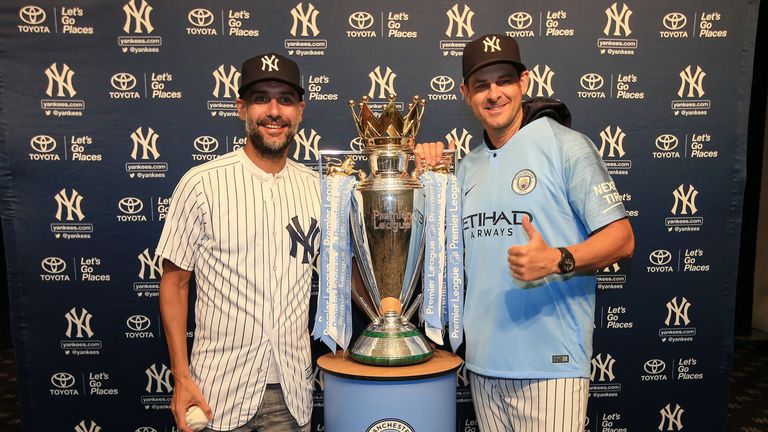 Guardiola and Boone were pictured alongside Premier League trophy after swapping shirts