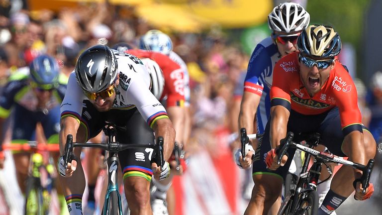 Sagan (left) holds off Sonny Colbrelli to win stage two by half a wheel