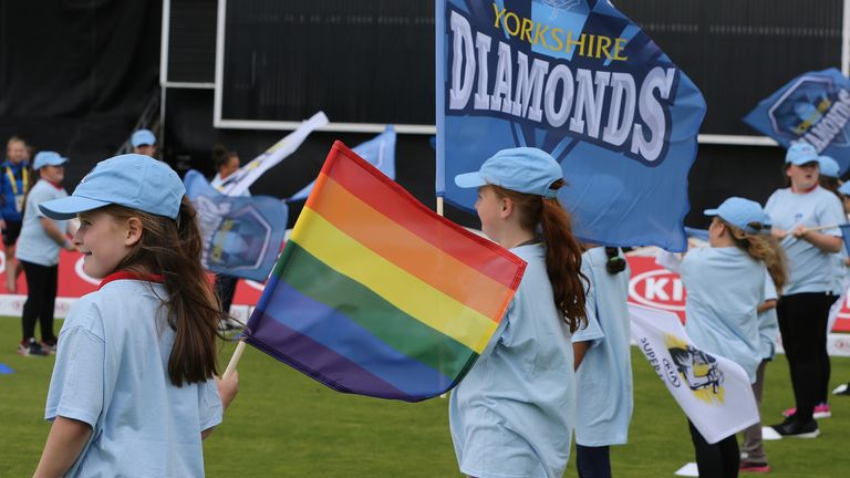 Guard of honour with rainbow flag ahead of the Kia Super League 2017 between Yorkshire Diamonds and Lancashire Thunder at Headingley on August 11, 2017 in Leeds, England. (Photo by Nigel Roddis/Getty Images)                                                      