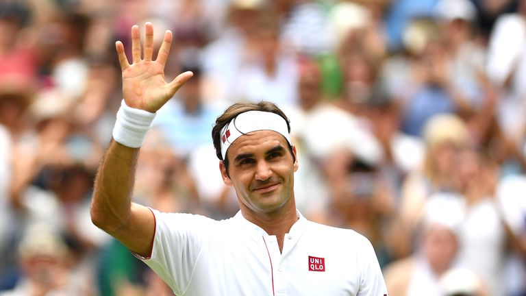 Roger Federer of Switzerland thanks the crowd after winning his Men's Singles fourth round match against Adrian Mannarino of France on day seven of the Wimbledon Lawn Tennis Championships at All England Lawn Tennis and Croquet Club on July 9, 2018 in London, England